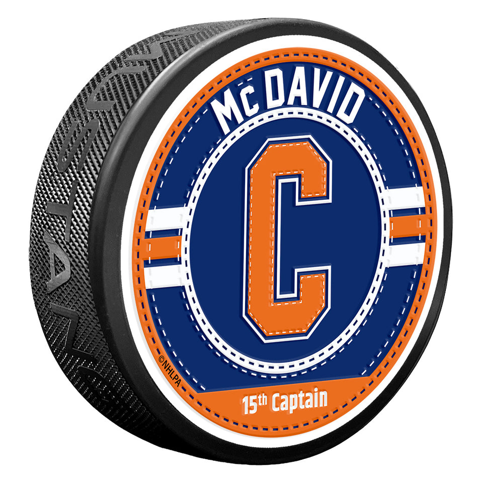 Edmonton Oilers Puck | Connor McDavid Captain Jersey Stitch