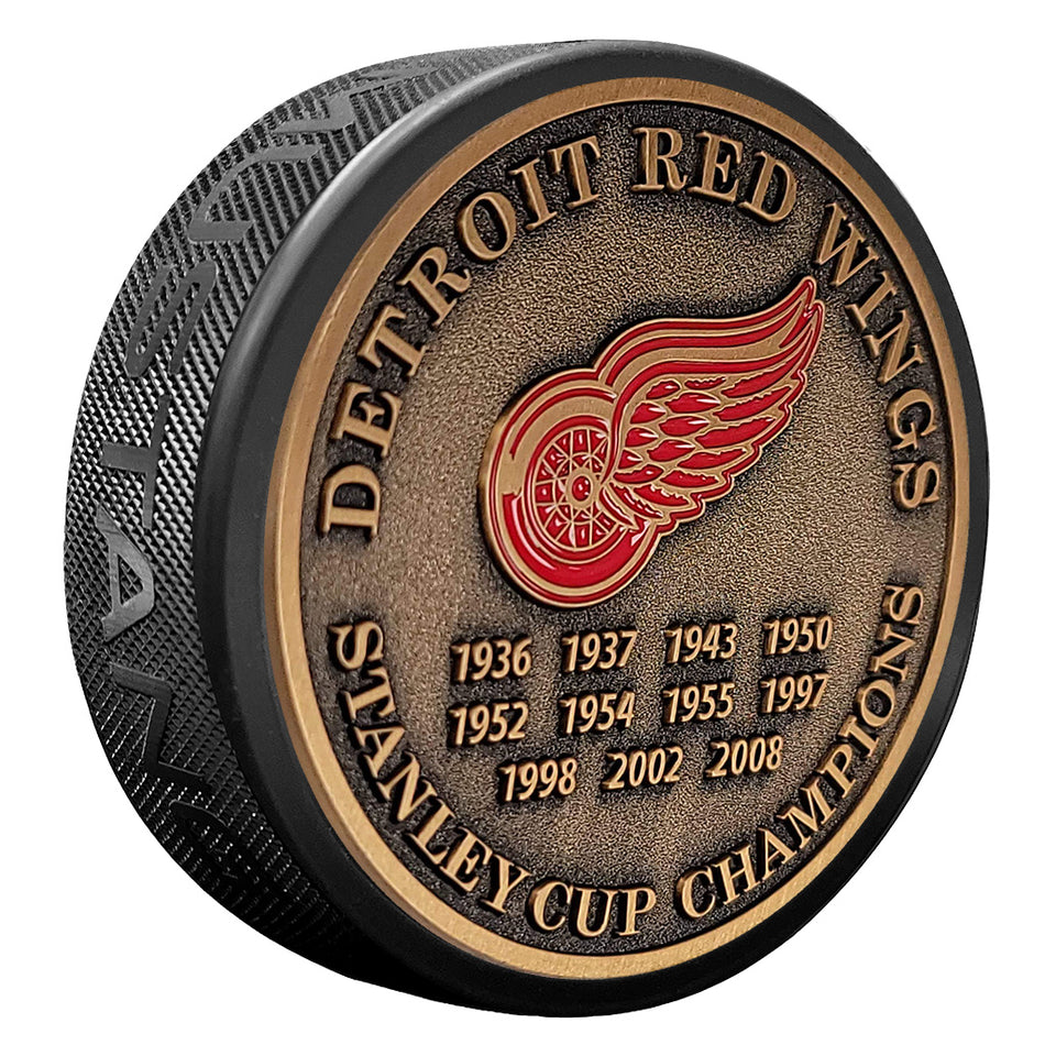 Detriot Red Wings Puck - Stanley Cup Years Gold Medallion