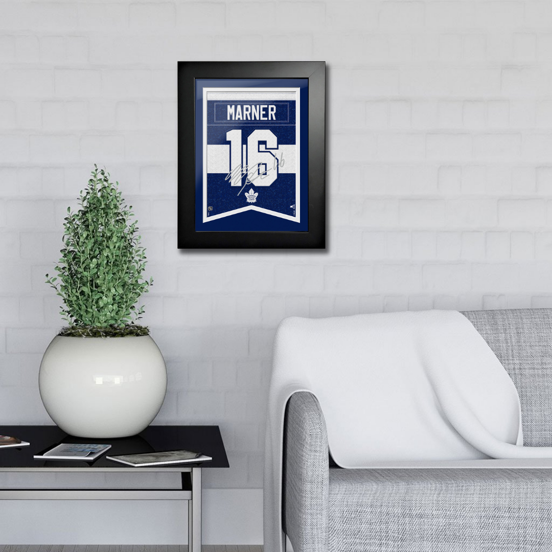 Toronto Maple Leafs Art-Mitch Marner Autograph Replica Frame 12"x16" in living room